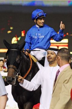 Mit Trainer Saeed bin Suroor am Zügel: Sajjhaa mit Silvestre de Sousa nach dem Erfolg im Dubai Duty Free. www.galoppfoto.de - Frank Sorge